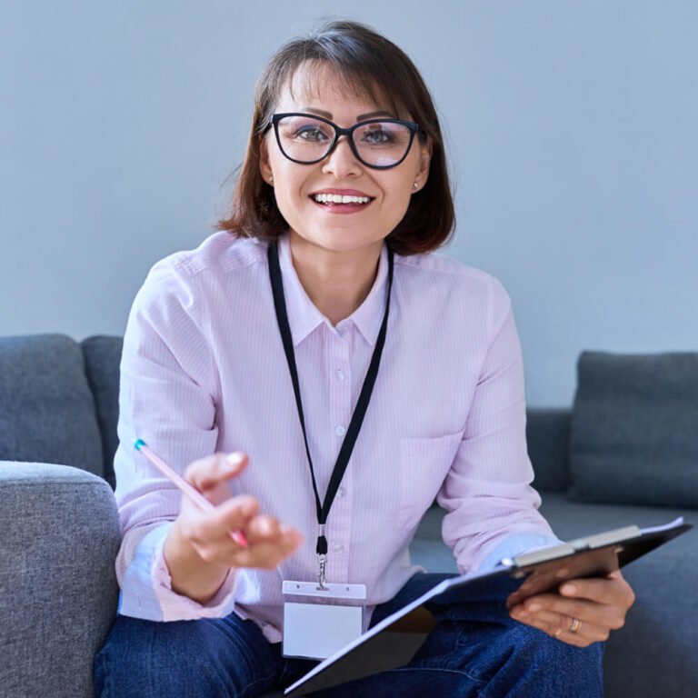An advisor with a clipboard ready to answer questions